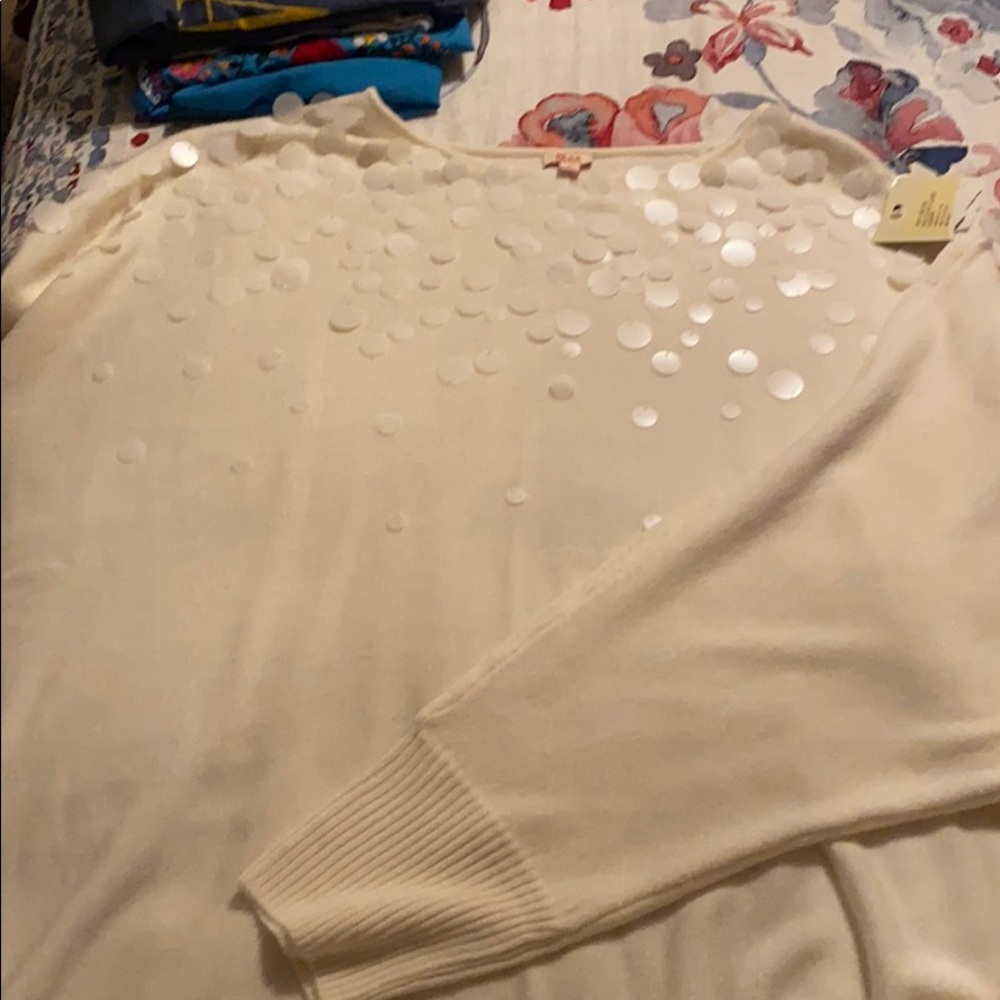 Long cream sweater